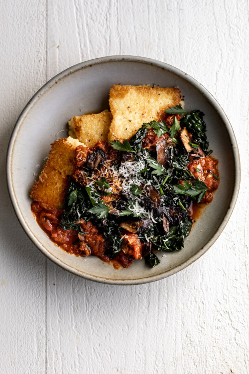 Crispy Polenta with Spicy Tomato Sauce, Sautéed Kale & Mushrooms